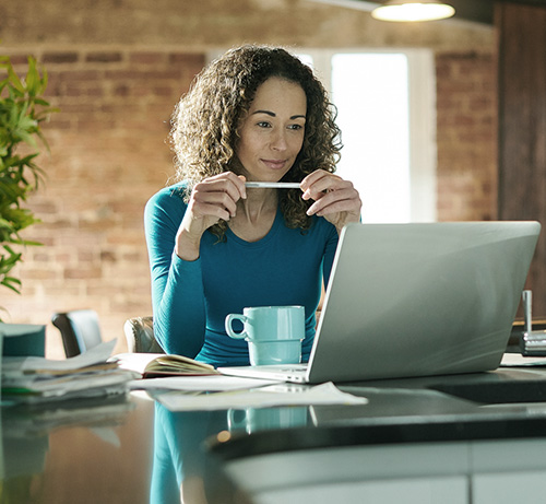 Business owner using a laptop.