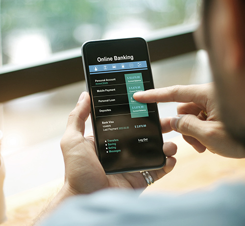 Person using phone and financial app.