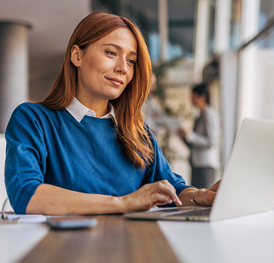 Person paying bills on a laptop.